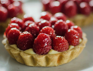 Raspberry tarts are really tasty treats for the whole family. At Lucy restaurant, we strive to prepare memorable dishes like the tart that you can enjoy with your kids. The crust is awesome.This is intended for sweets lovers. Visit us and feel the taste.